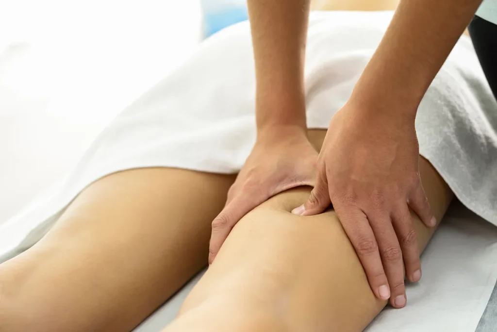 medical massage at the leg in a physiotherapy